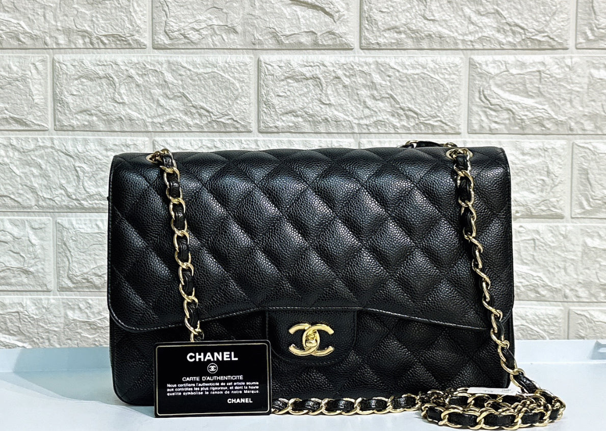 Chanel Jumbo Classic Double Flap Bag Black Caviar Gold Hardware