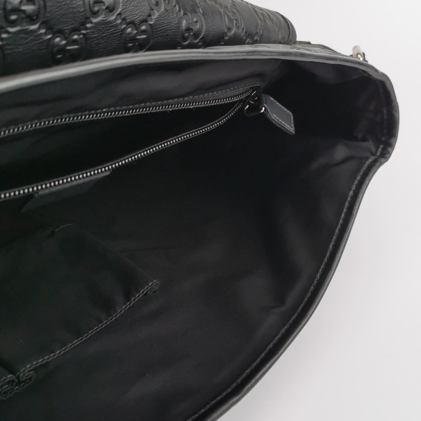 Gucci GG Embossed Crossbody Bag