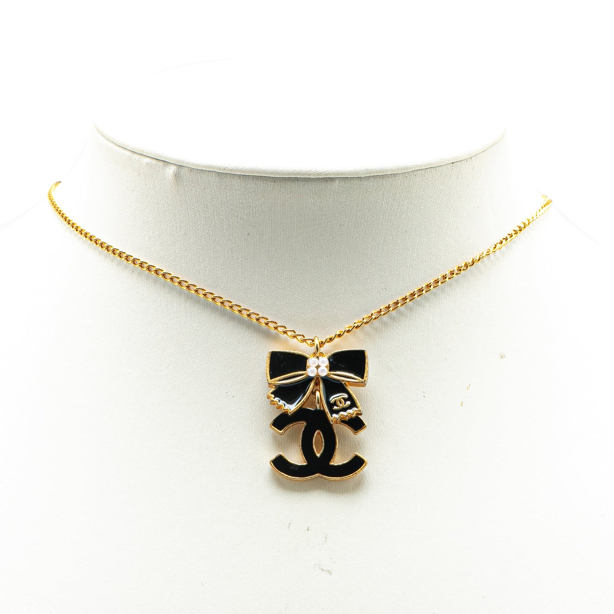 Gold Chanel Gold Plated and Enamel CC Ribbon Pendant Necklace