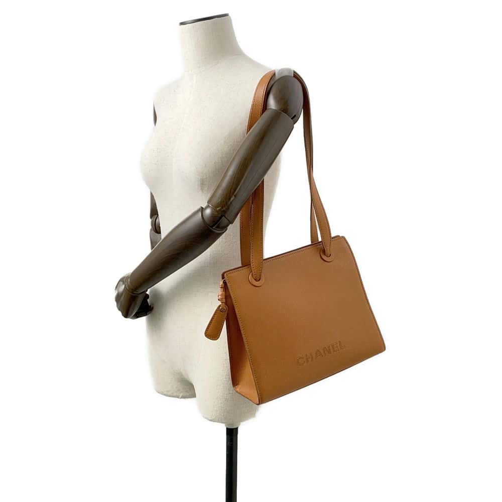 CHANEL Embroidered Logo Shoulder Bag Brown Caviar Leather