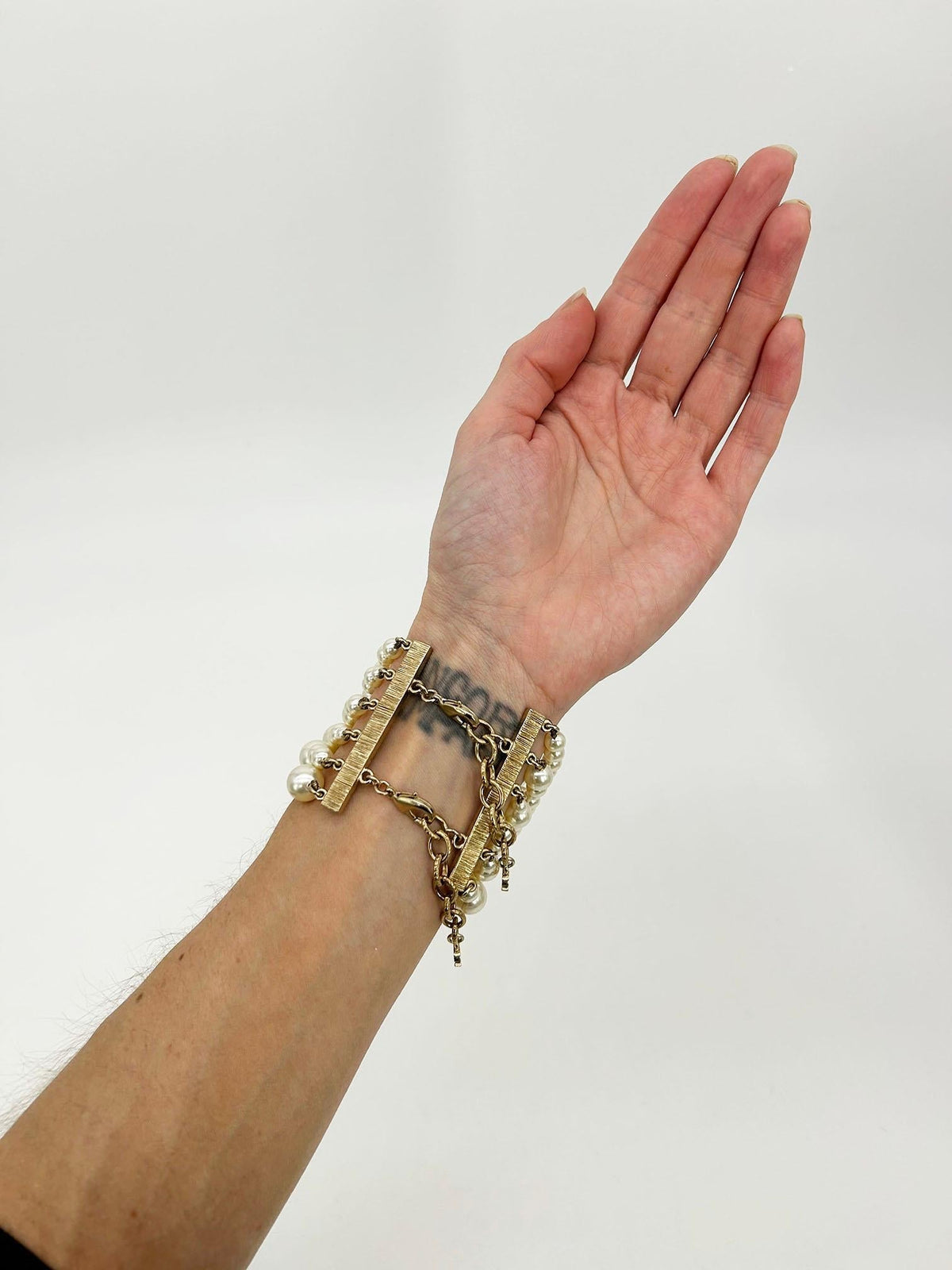 CHANEL Pearl Strand Charm Bracelet