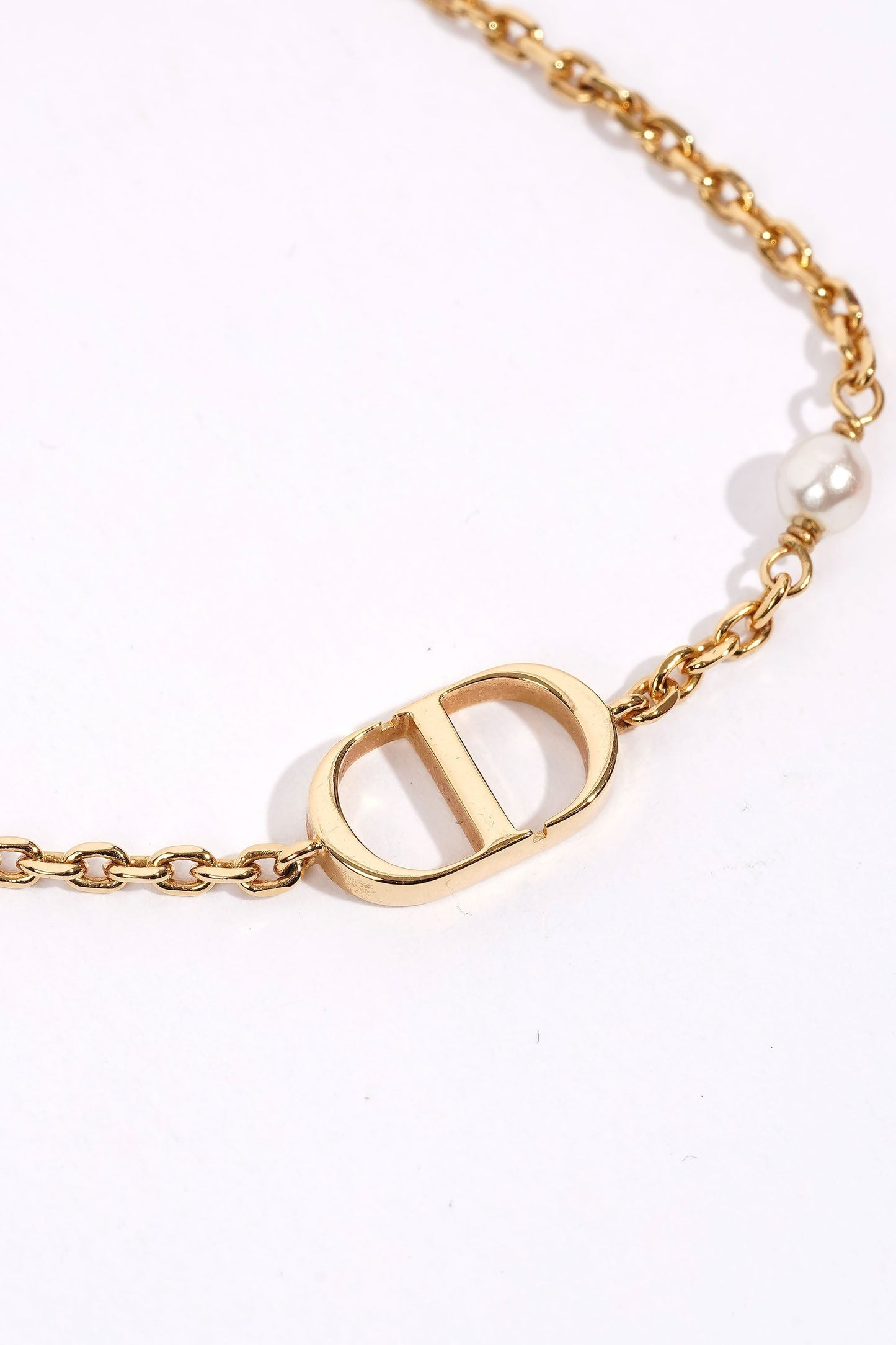 Christian Dior Petit CD Bracelet Gold-Finish Metal with a White Resin Pearl Gold Base Metal