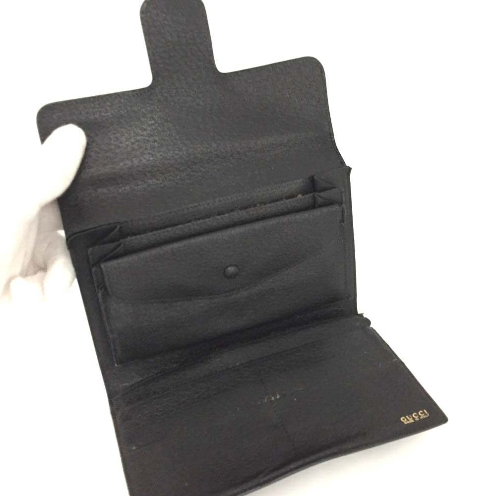 Unique, vintage, Gucci, RARE, black leather, clutch style purse or extra large wallet with a gold horse-bit accent at the clasp