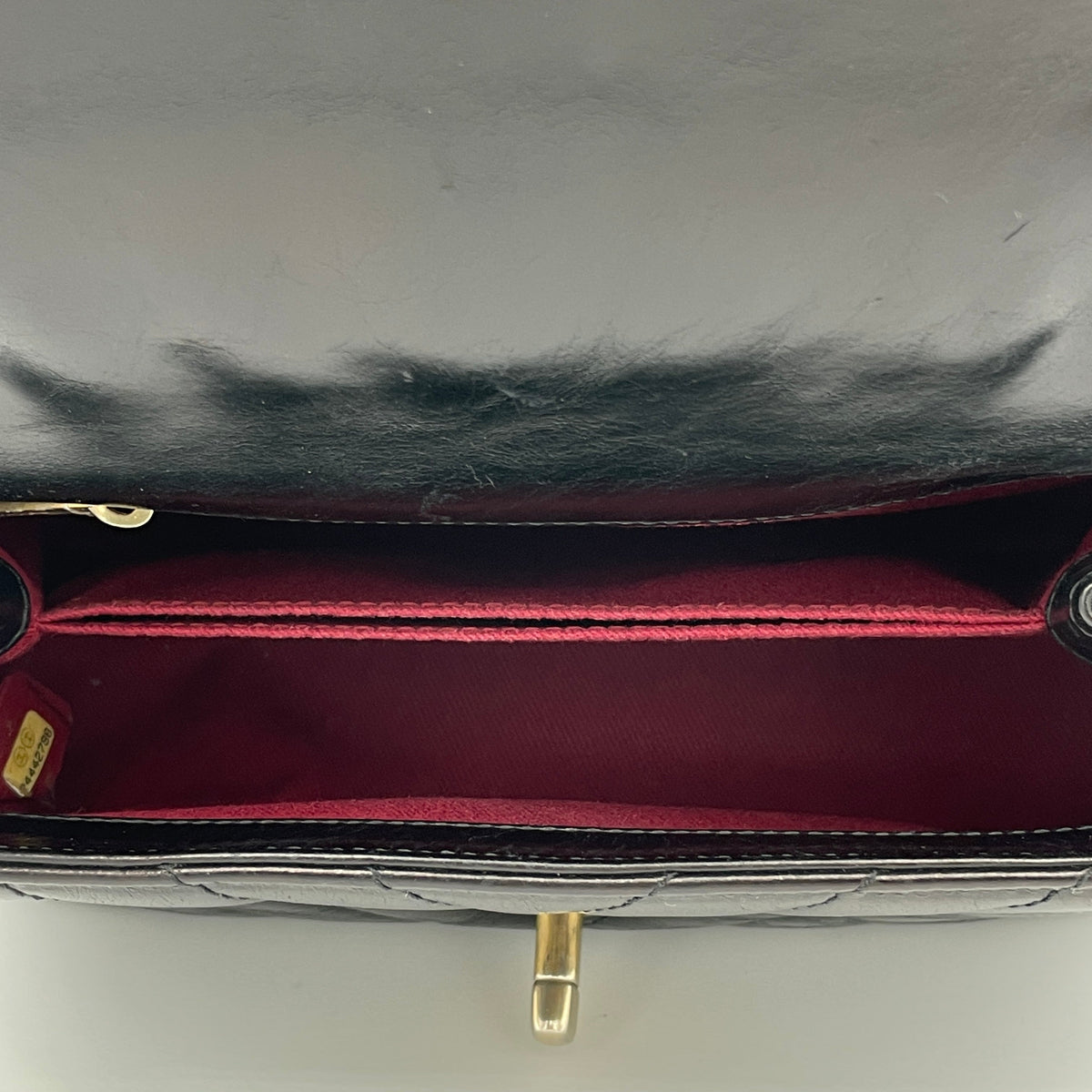 Coco Flap Black Top Handle Bag in Calfskin, Gold hardware