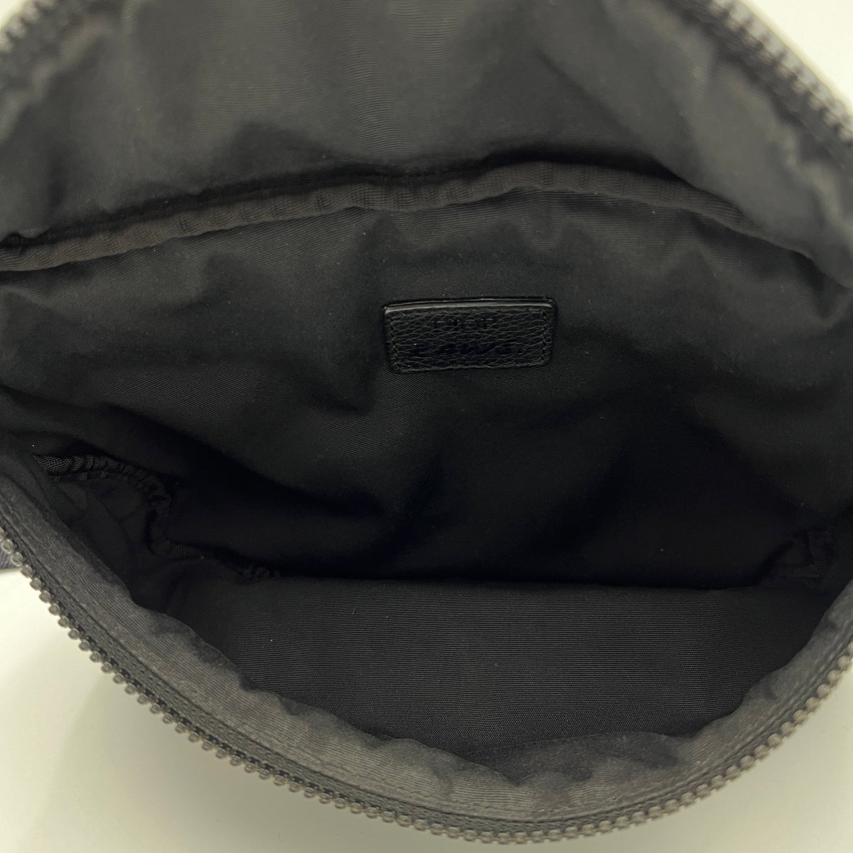 x Kaws Black Belt Bag in Nylon, Silver hardware