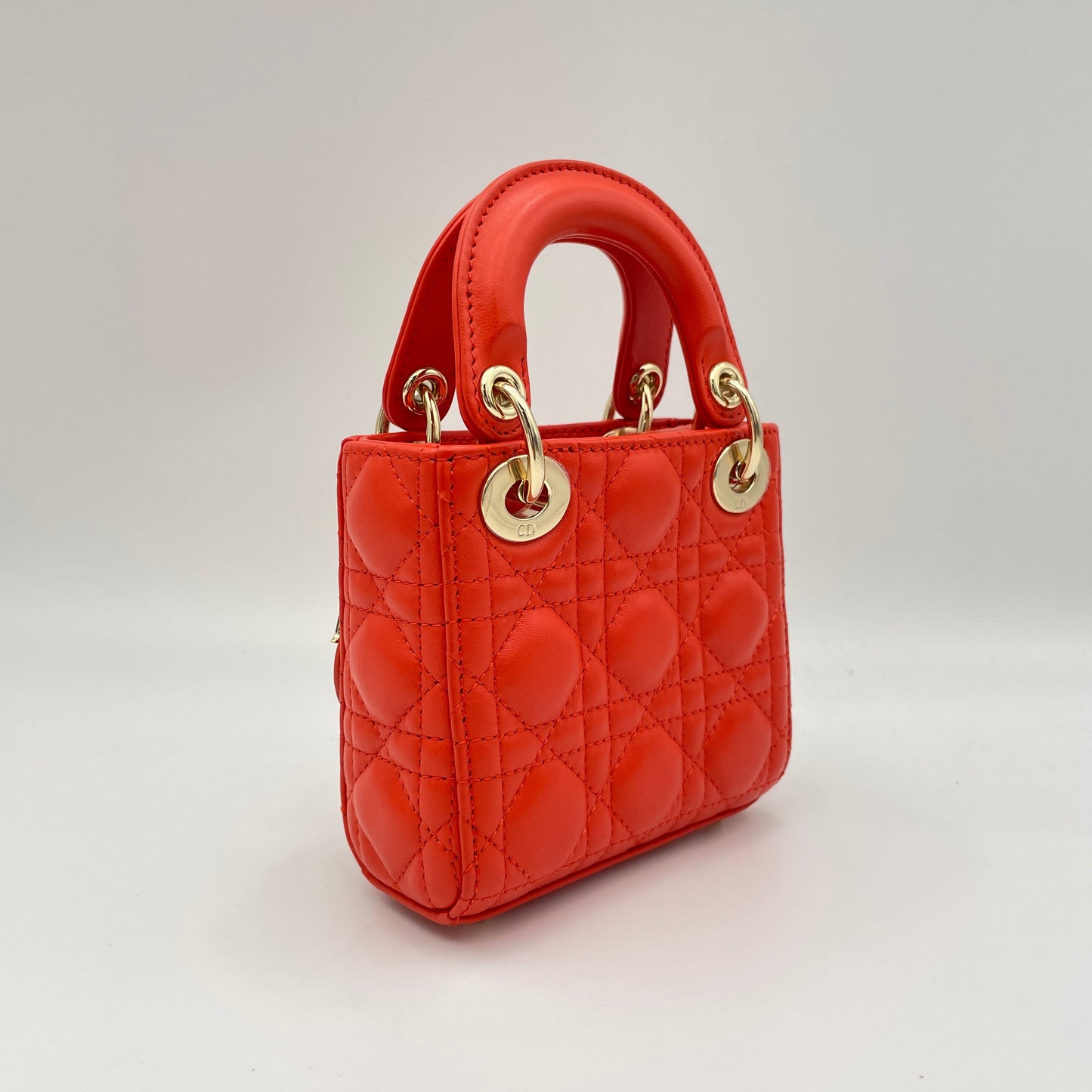 Lady Dior Micro Orange Top Handle Bag in Lambskin, Gold hardware