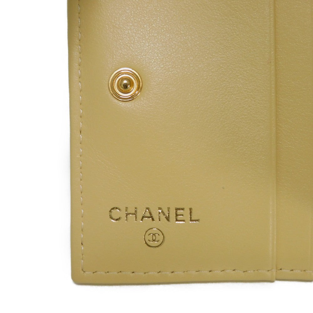 CHANEL Bifold Wallet AP3519 Grained shiny calfskin (embossed) Light yellow x light purple COCO Mark Small flap wallet Women Used