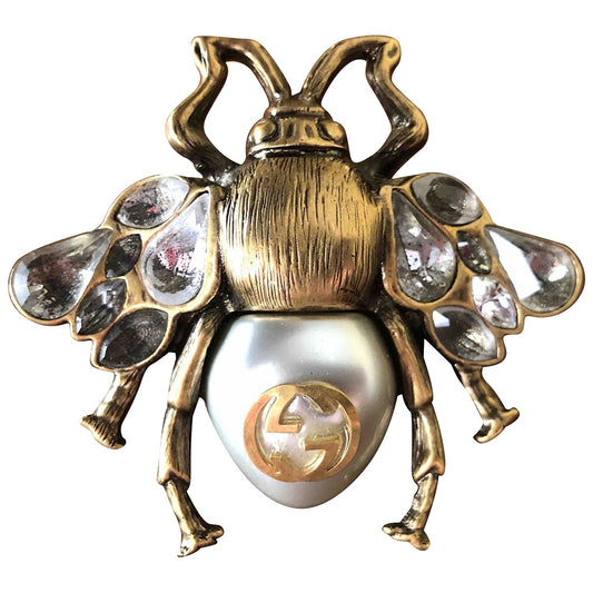 Gucci gold metal rings
