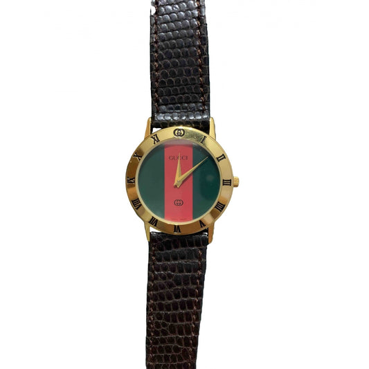 Gucci multicolour gold plated watch