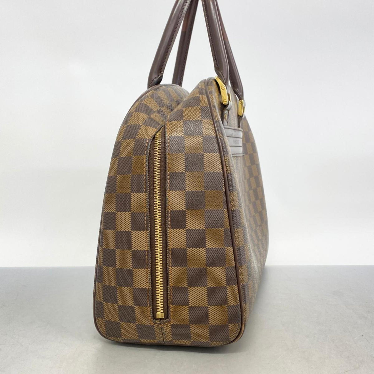 LOUIS VUITTON Nolita Handbag