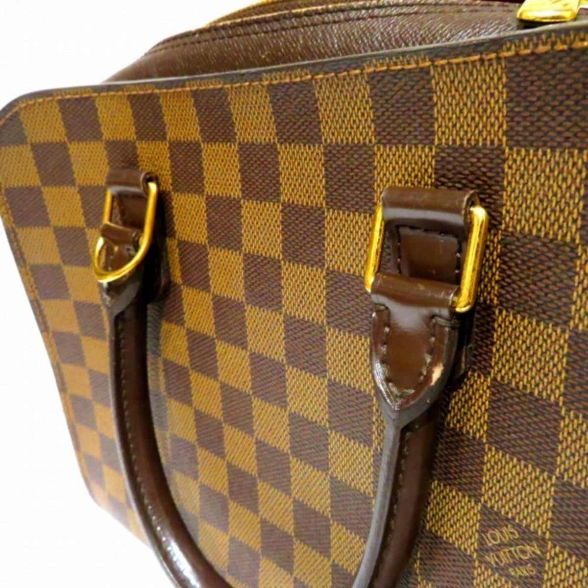 LOUIS VUITTON Triana Handbag