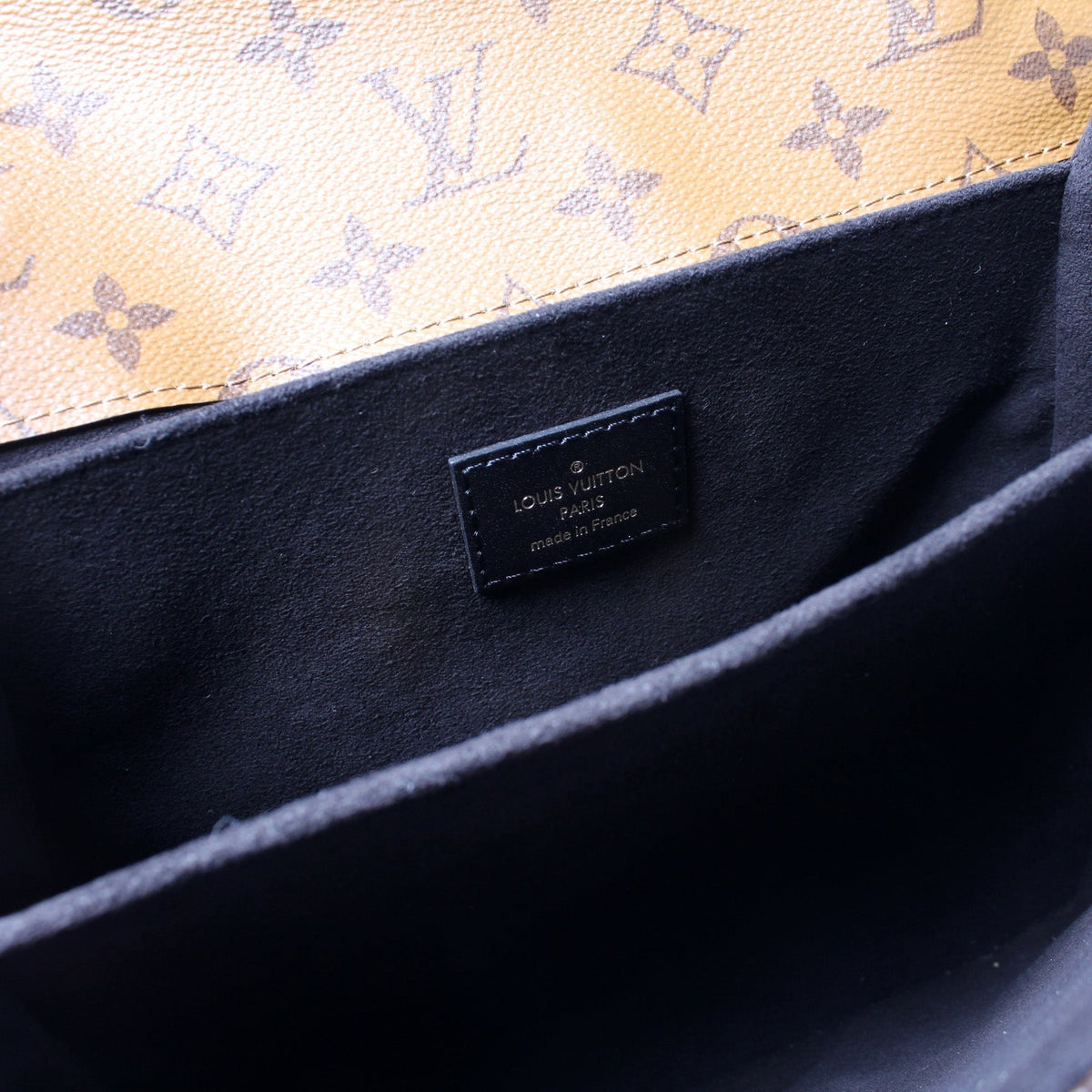 Pochette Metis Reverse Monogram