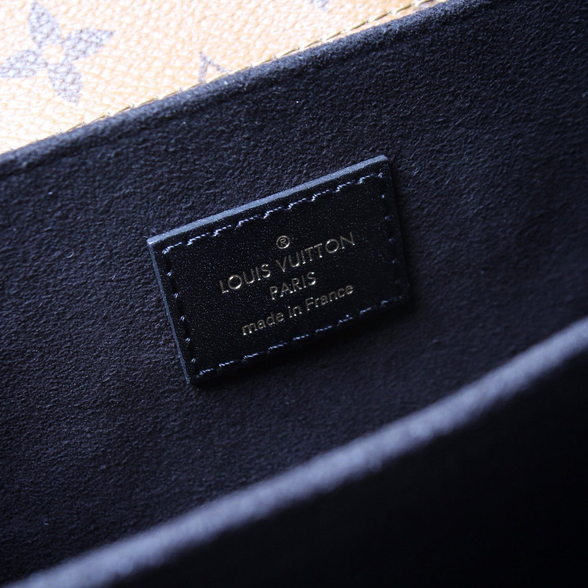 Pochette Metis Reverse Monogram