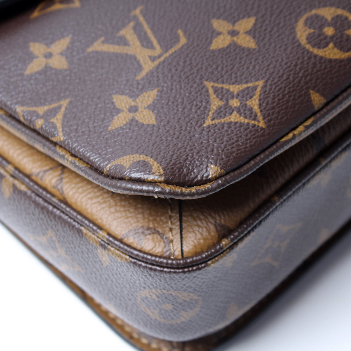 Pochette Metis Reverse Monogram