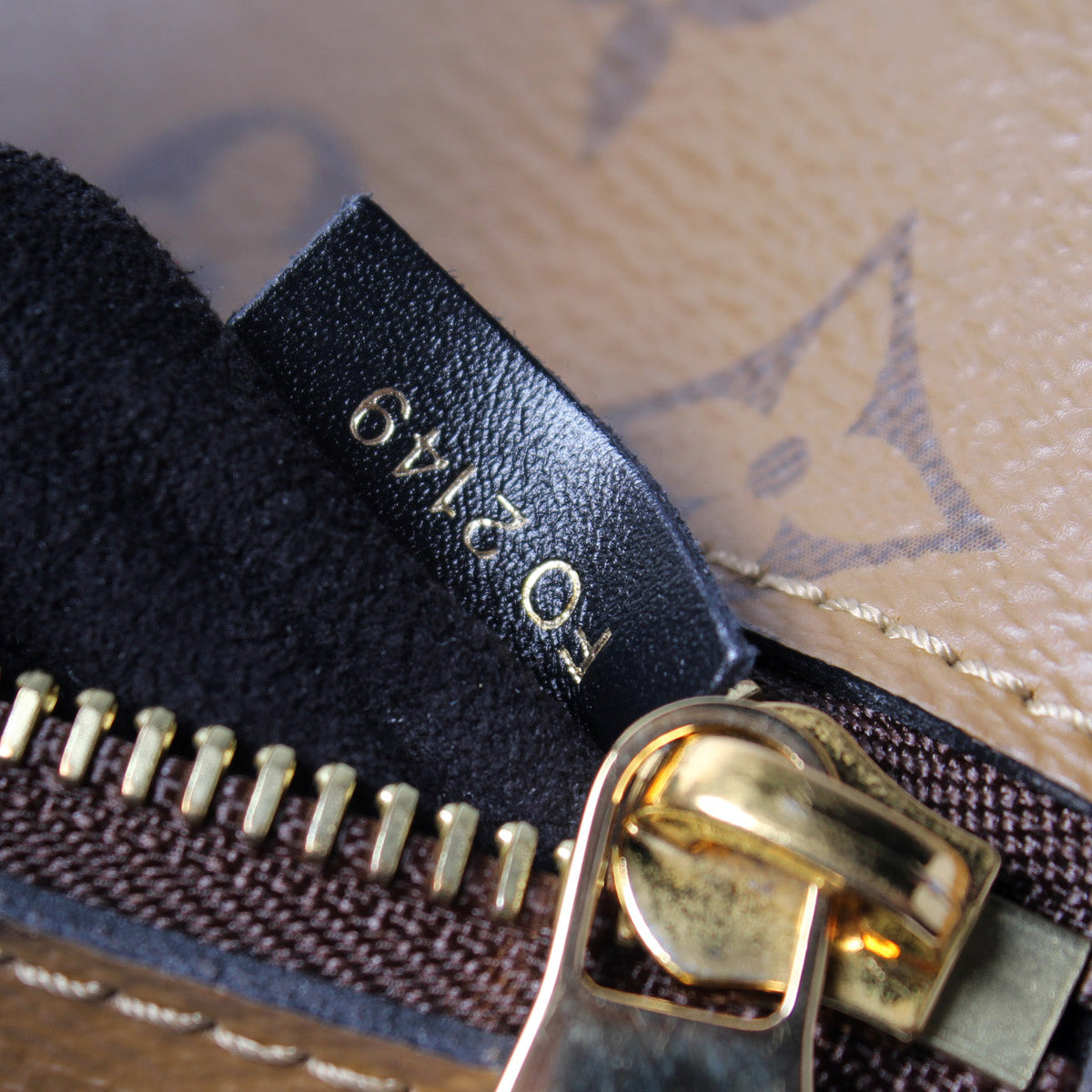 Pochette Metis Reverse Monogram