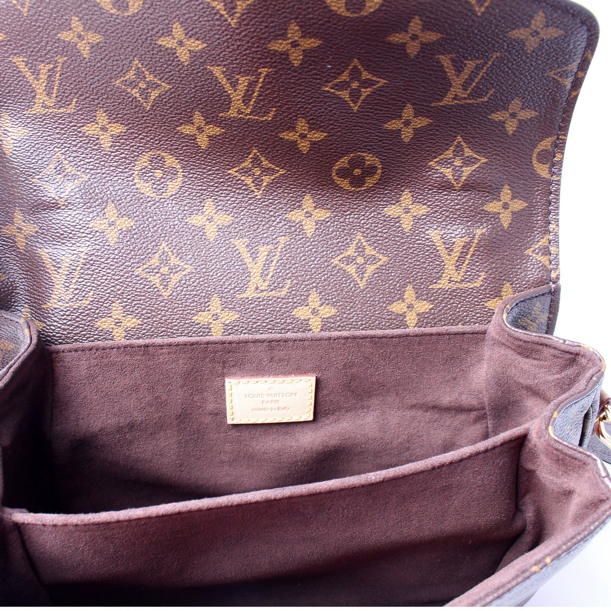 Pochette Metis Monogram