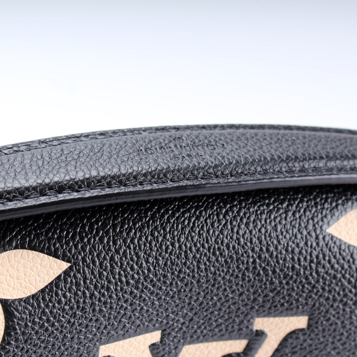 Pochette Metis Bicolor Empreinte