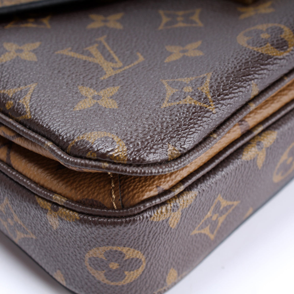 Pochette Metis Reverse Monogram