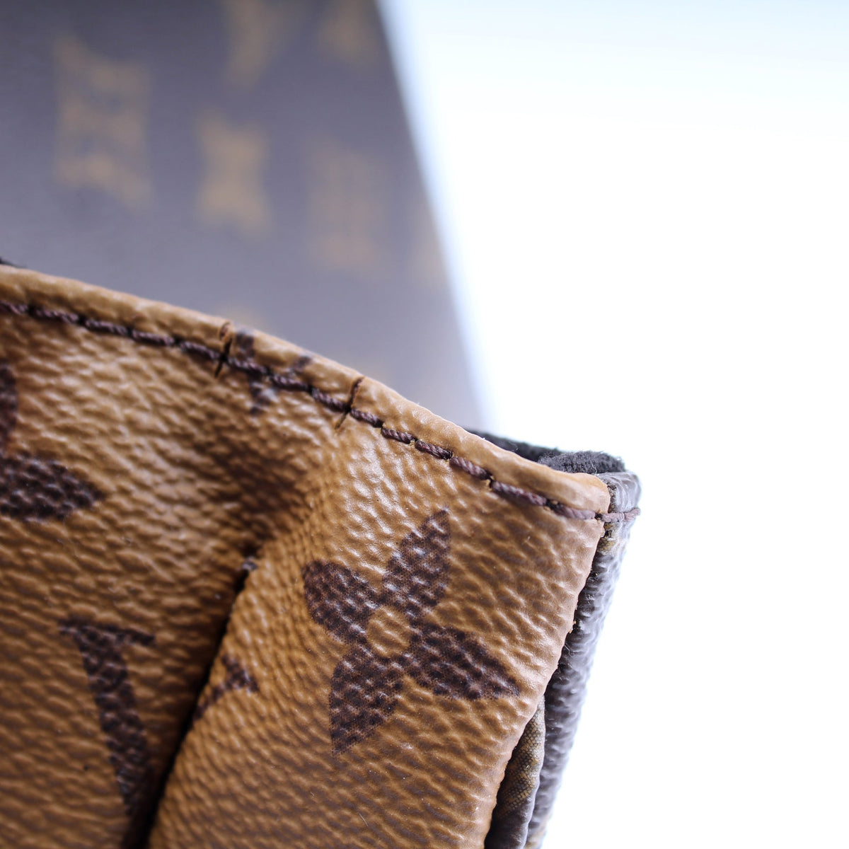 Pochette Metis Reverse Monogram