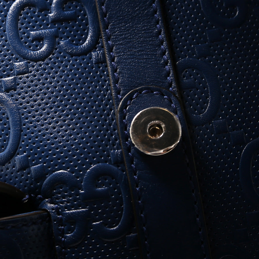 GG Embossed Leather Backpack