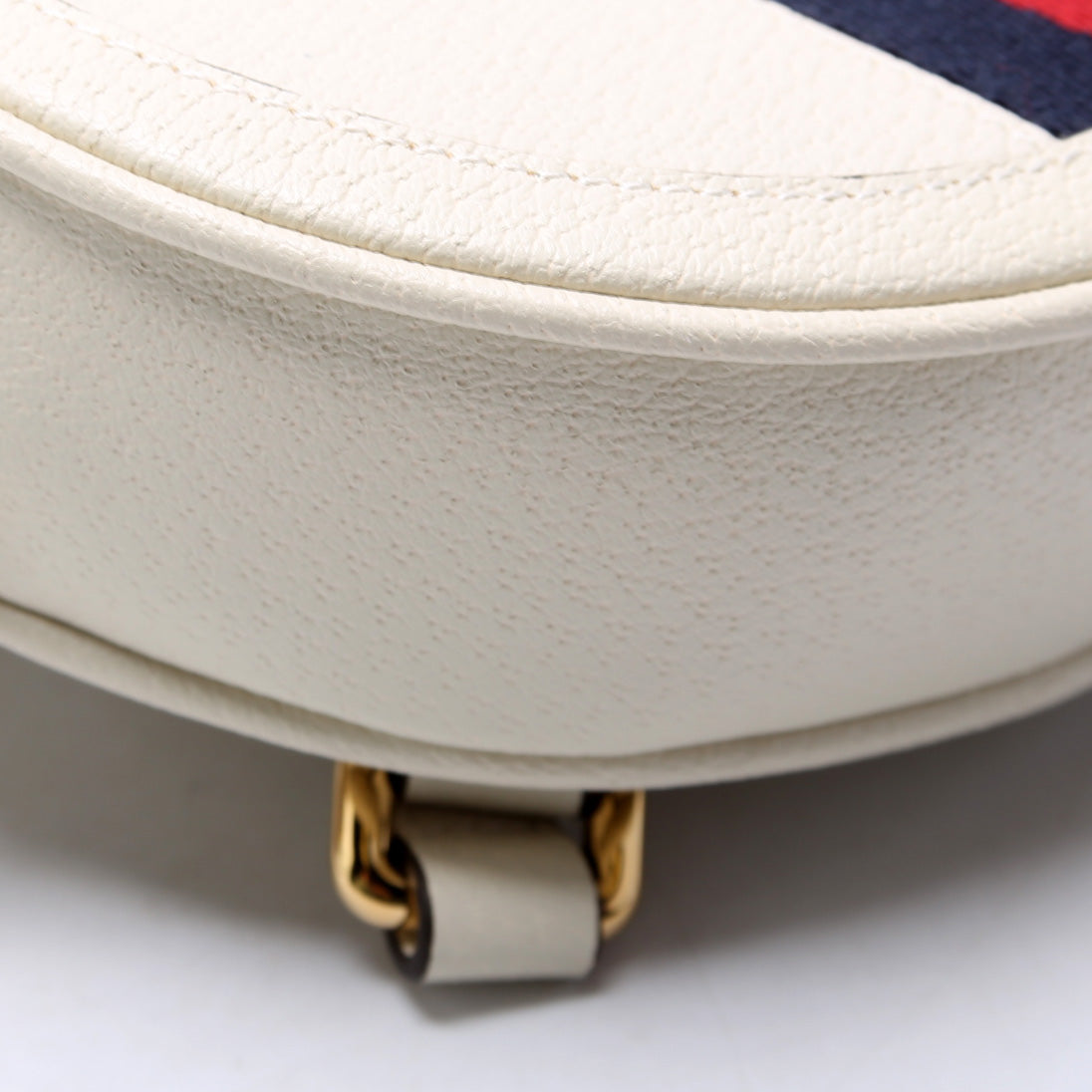 Ophidia Web Mini Round Backpack