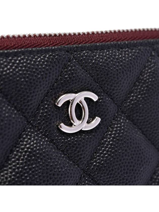 Women s un clutch caviar large Chanel