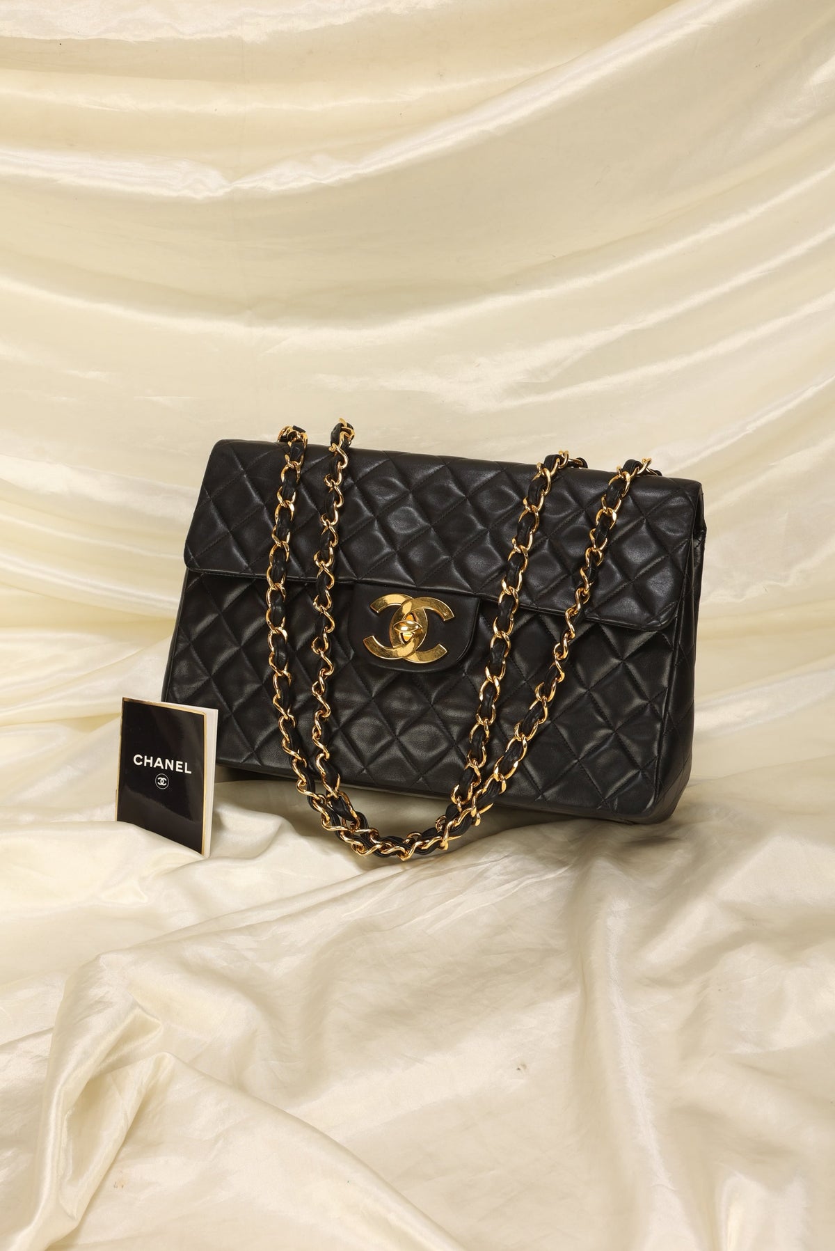 Chanel Maxi XL Logo Flap Bag