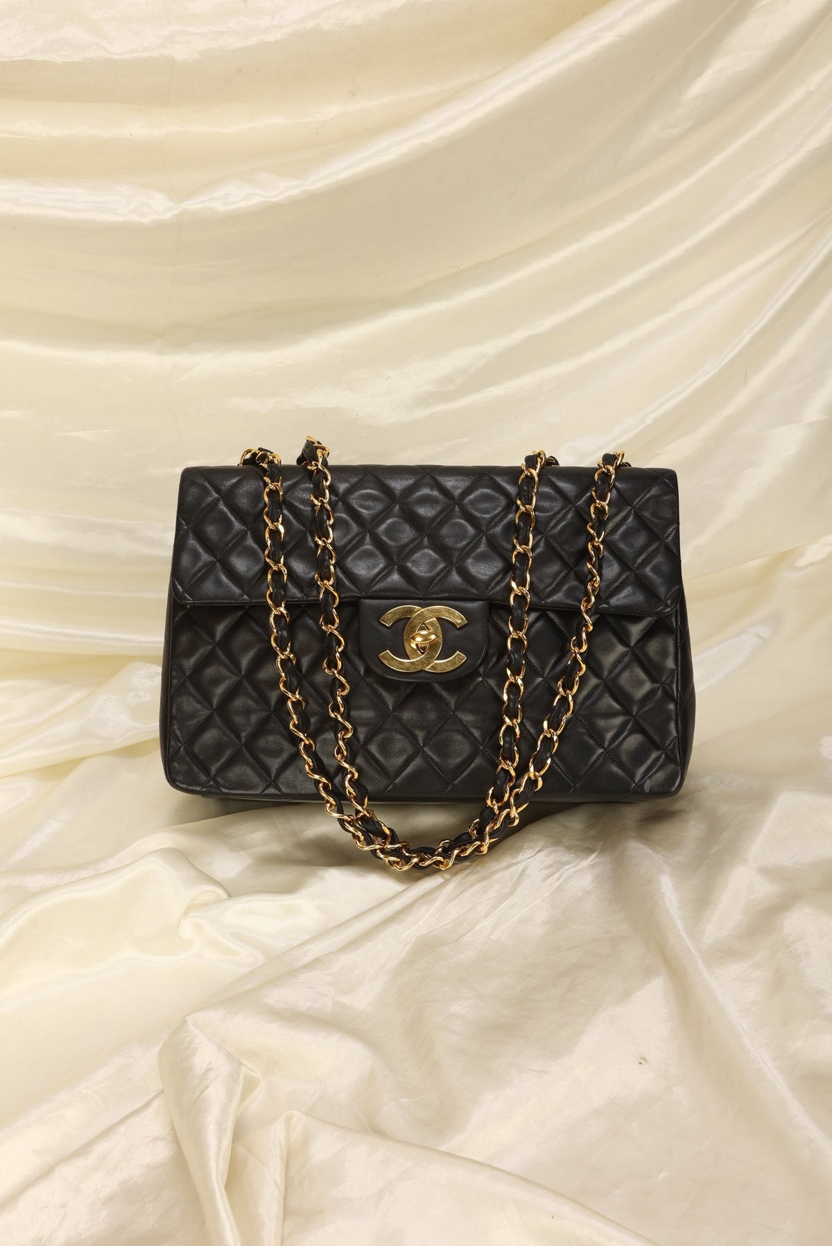 Chanel Maxi XL Logo Flap Bag
