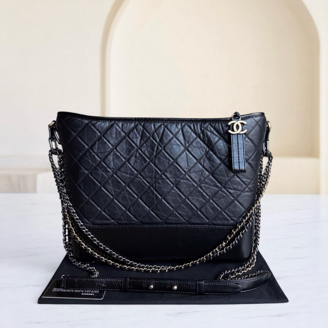 Chanel Gabrielle Large - Quilted Aged Calfskin Black Two-tone Gold Hardware Series 24