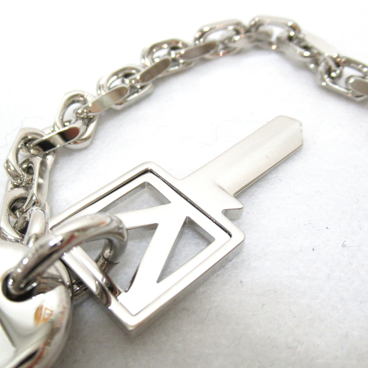 LOUIS VUITTON Portocle Chenne V Square Keychain Silver Stainless Steel M61994