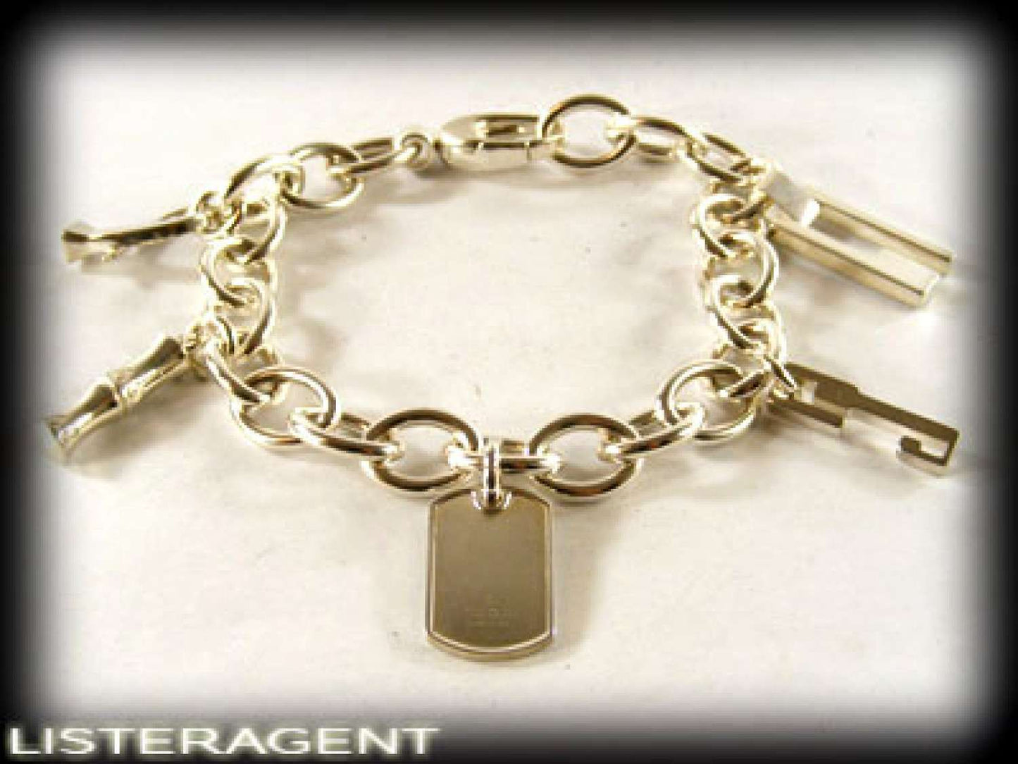 GUCCI BRACELET WITH PENDANTS IN 925 SILVER