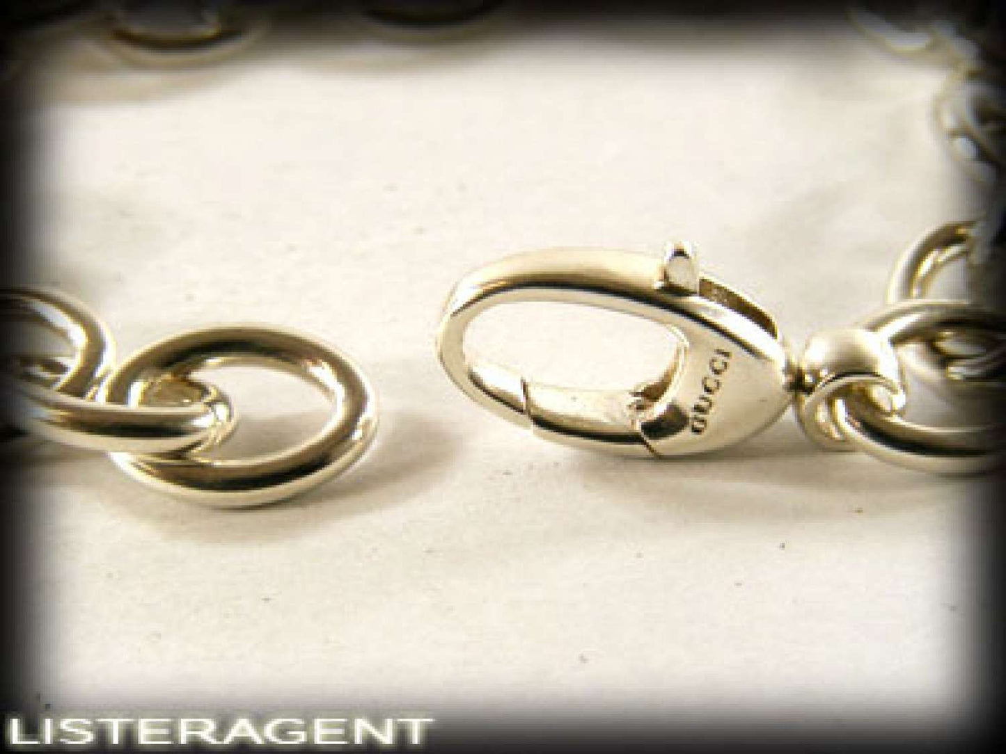 GUCCI BRACELET WITH PENDANTS IN 925 SILVER