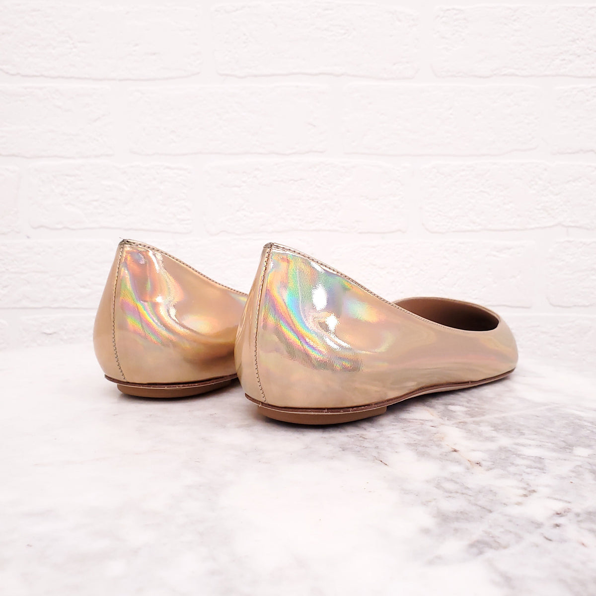 STUART WEITZMAN GOLD PATENT FLATS - SIZE 9.5