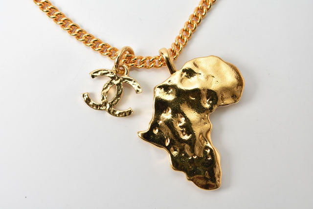 Chanel Necklace/Pendant Chain with African Motif, CC Rhinestones, Gold