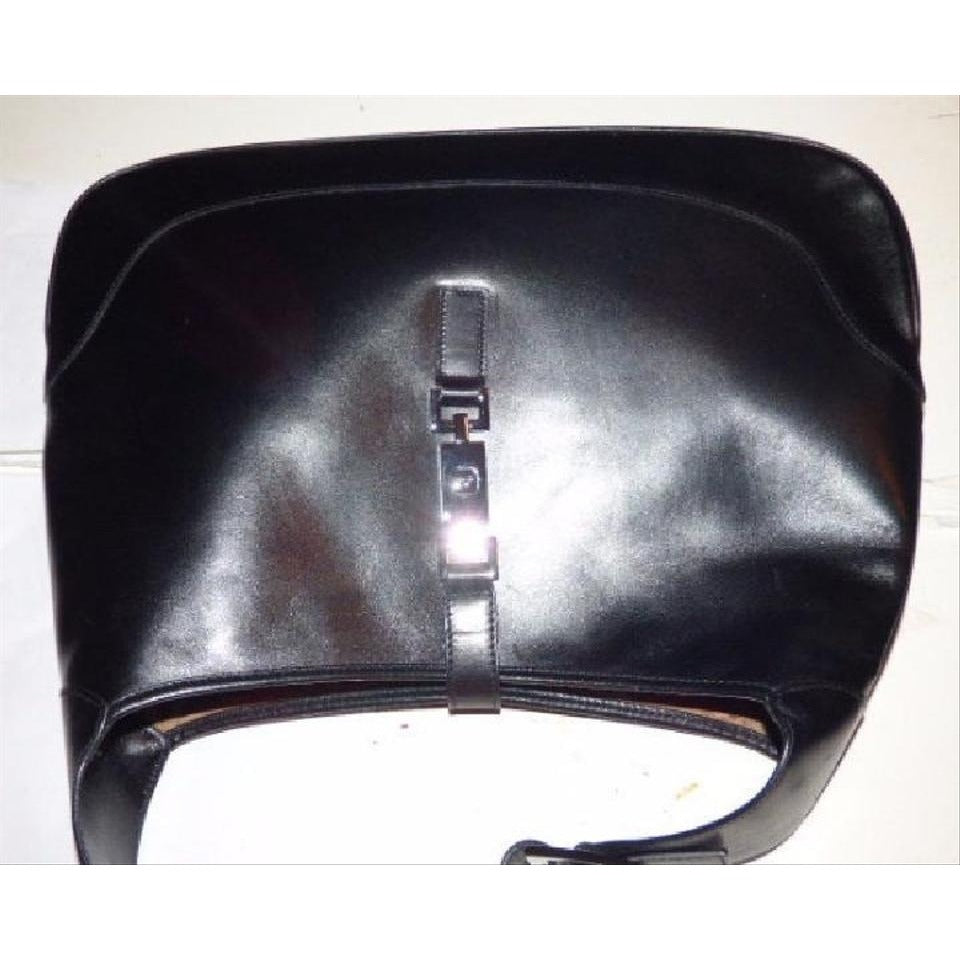 SOLD- Gucci, extra large size, classic, Jackie- O bag, made in hard to find,black all leather with a chrome piston closure and buckle