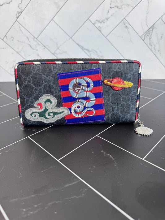 Gucci Canvas Courier Zippy Wallet