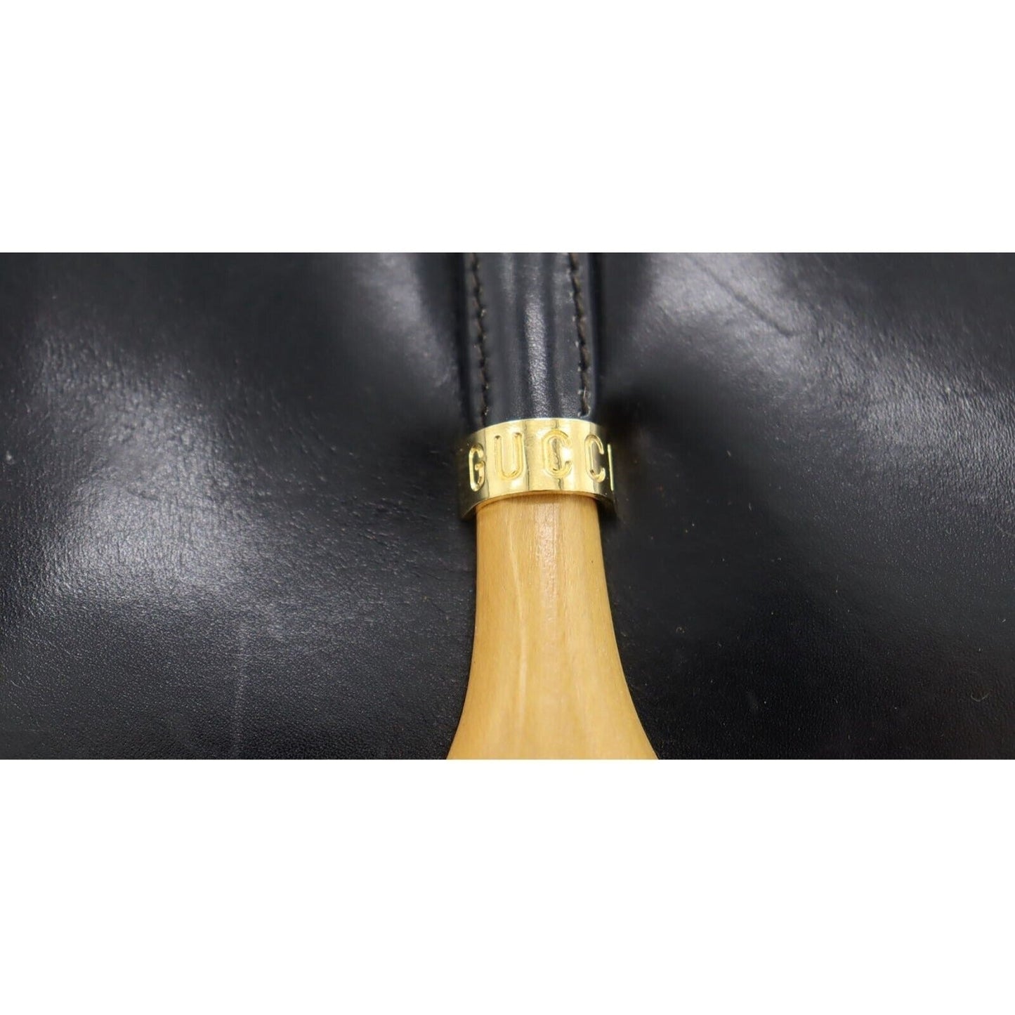 Vintage, navy leather, Gucci shoulder bag with XL gold & tan leather horsebit accent with cut-out & 'GUCCI' engraved on top