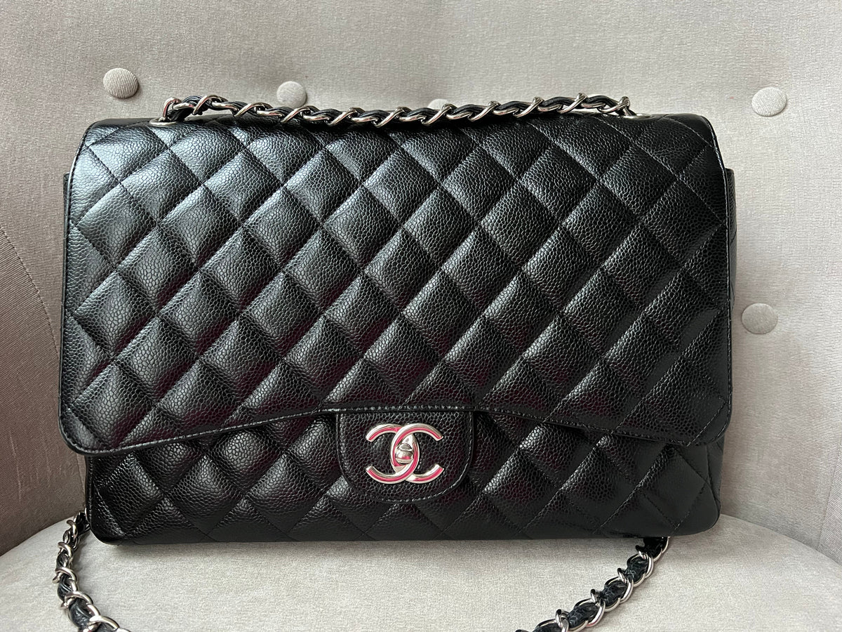 Chanel Maxi Double Flap in Black Caviar