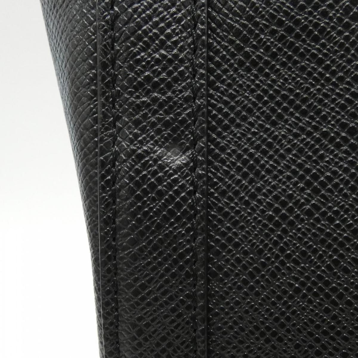 Louis Vuitton Taiga Vertical Tote M30811 Bag