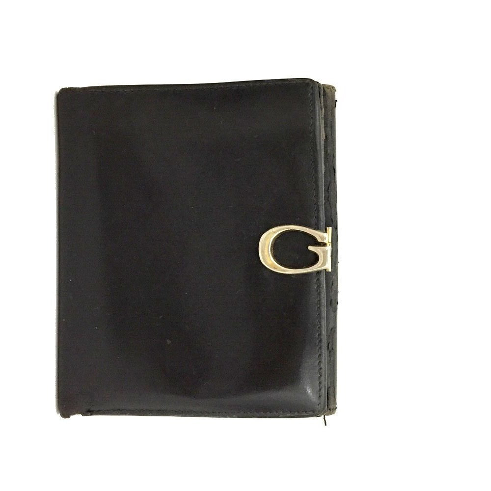 Gucci, black glossy leather, bi-fold style, rectangular, wallet with multiple pockets, tons of card slots, and a gold, hinged G clasp