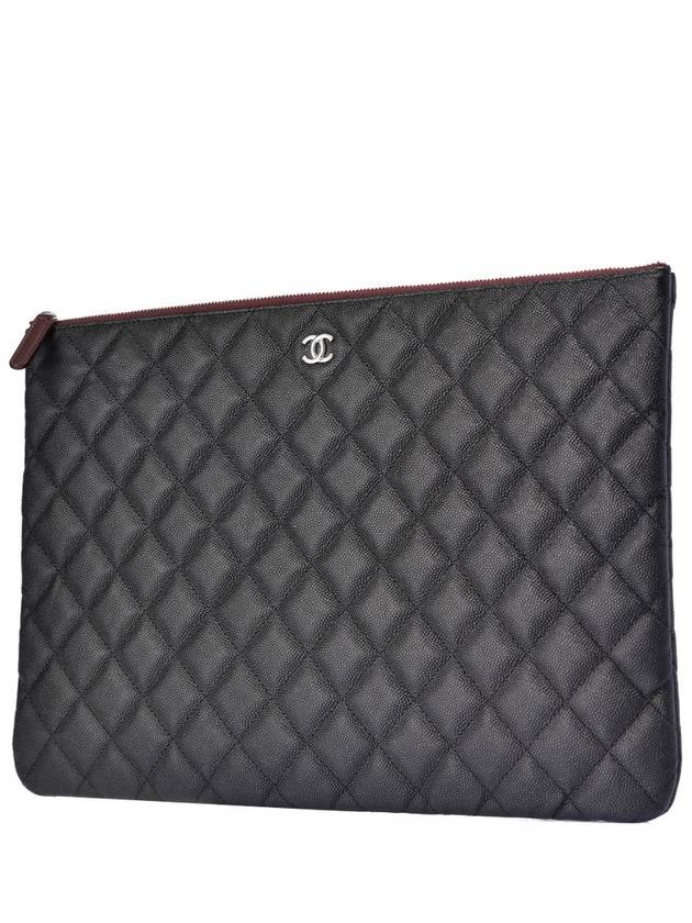 Women s un clutch caviar large Chanel
