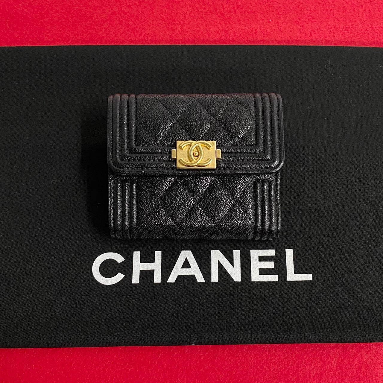 CHANEL Tri-fold wallet leather black Boy chanel