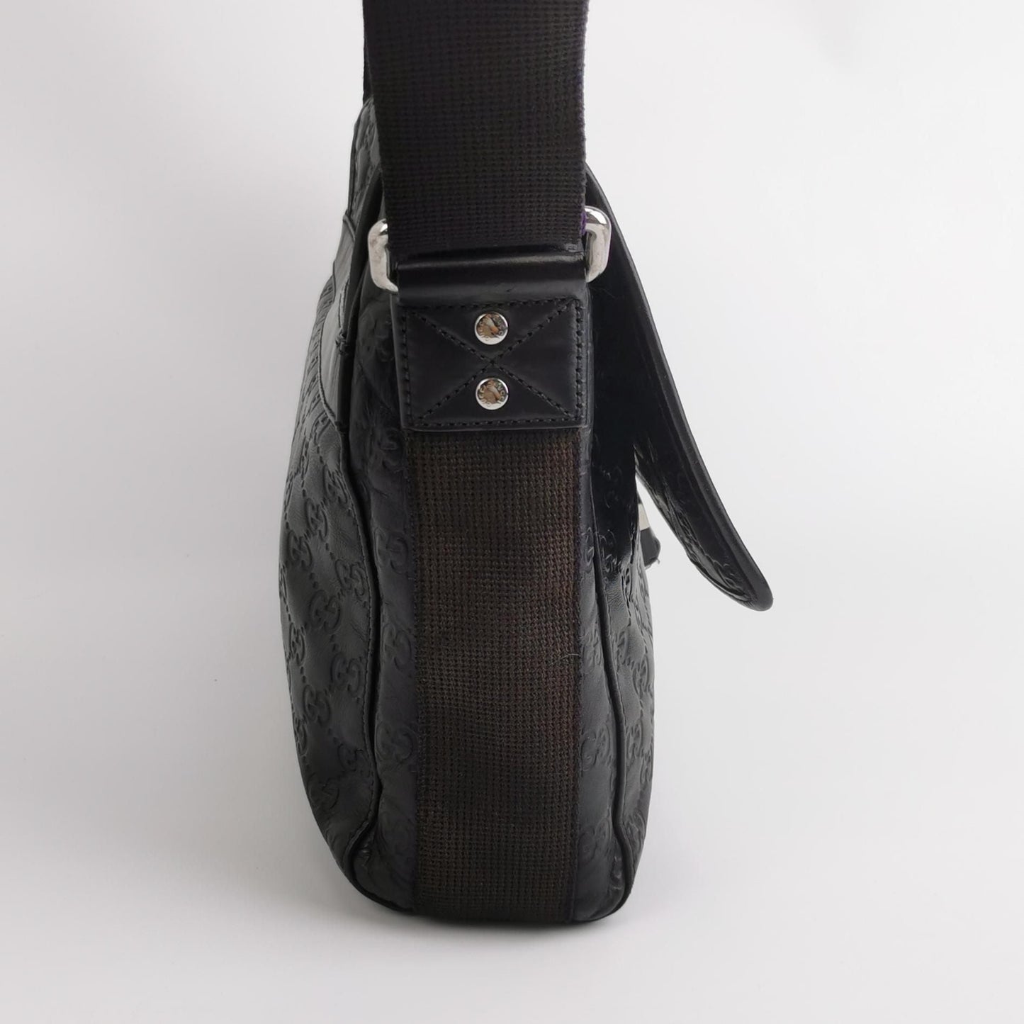 Gucci GG Embossed Crossbody Bag