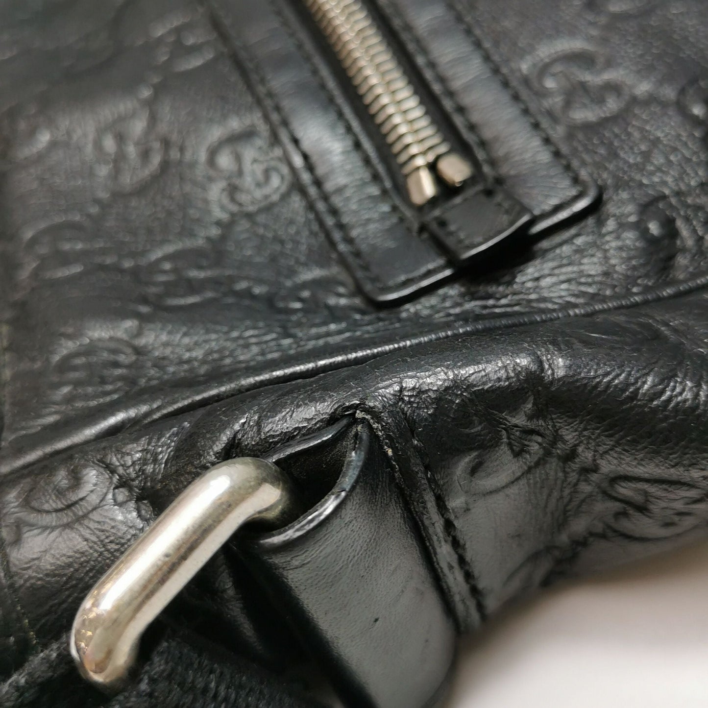 Gucci GG Embossed Leather Crossbody Bag