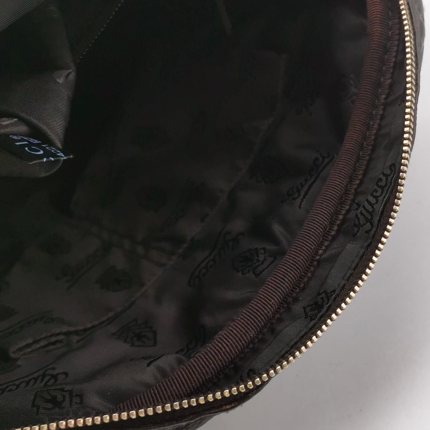 Gucci GG Embossed Crossbody Bag