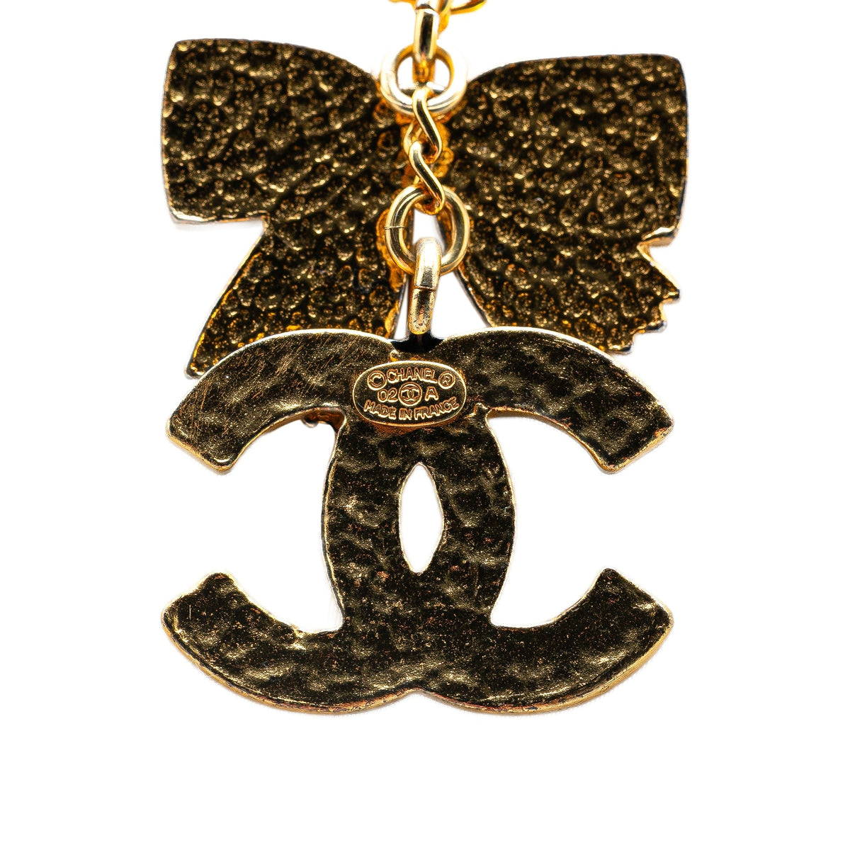 Gold Chanel Gold Plated and Enamel CC Ribbon Pendant Necklace