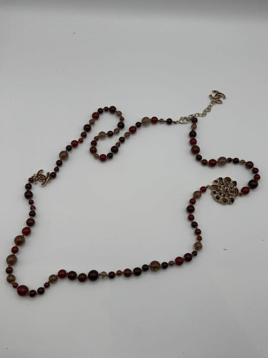 Chanel - Sautoir perles bordeaux