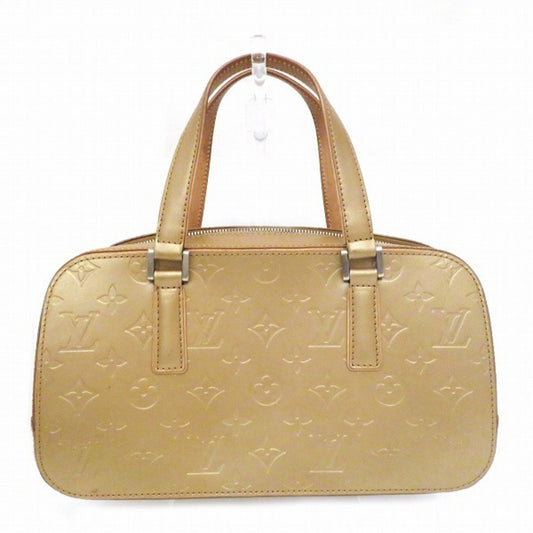 Louis Vuitton Gold Patent leather Shelton handbag bag