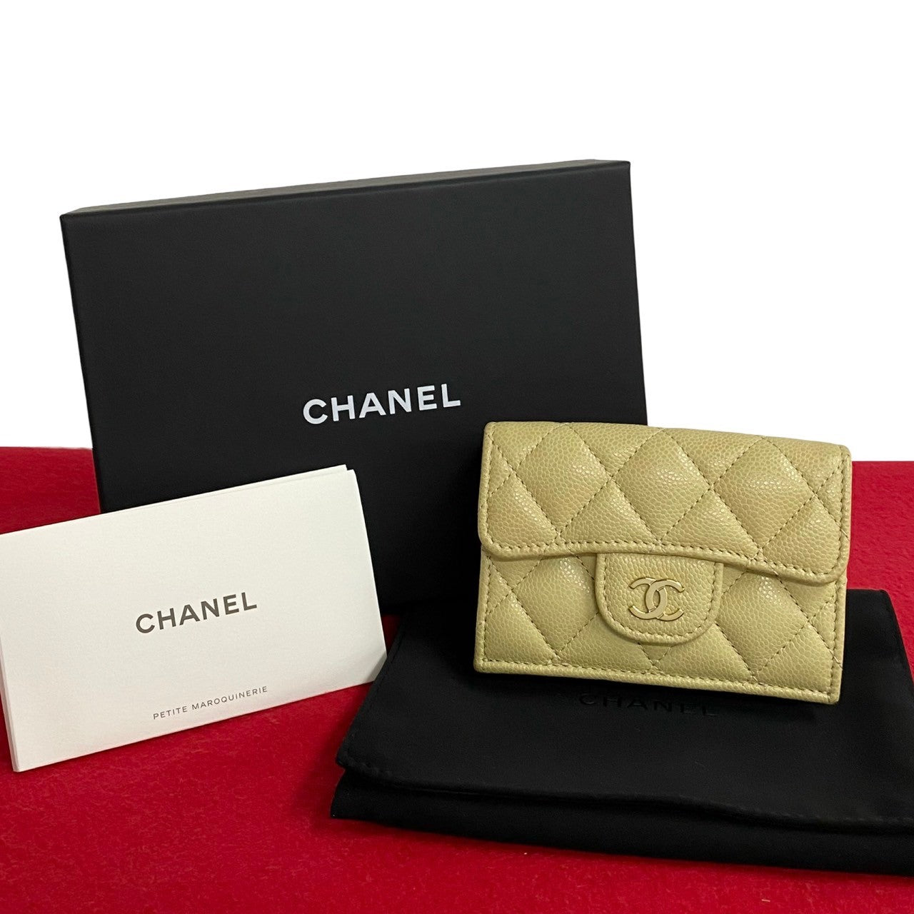 CHANEL Tri-fold wallet leather beige Caviar skin