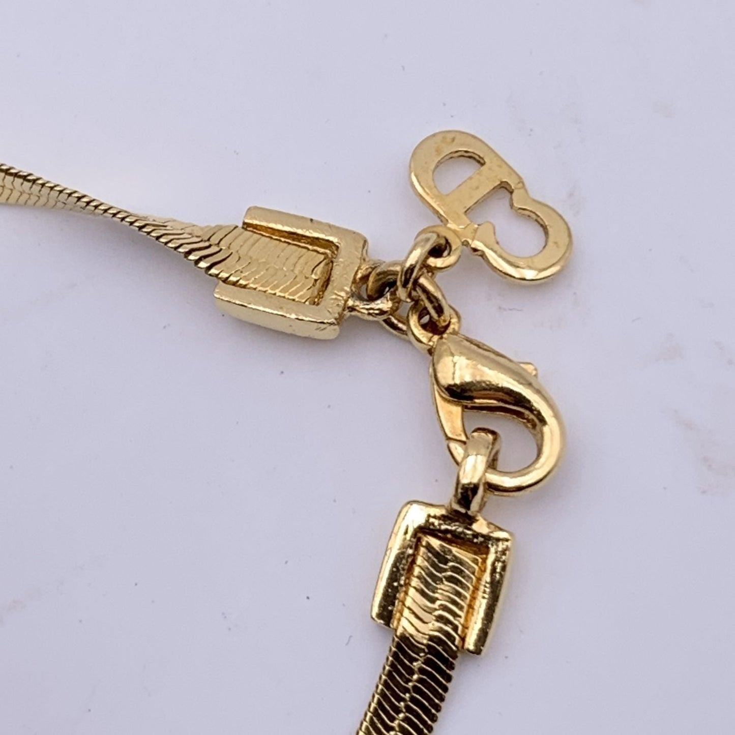 CHRISTIAN DIOR Gold Metal D Logo Pendant Snake Chain Bracelet